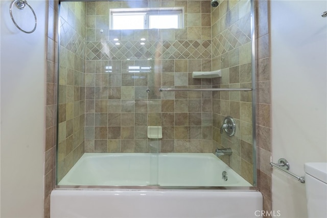 10838 Burnet Ave, San Fernando, CA 91345 - bathroom featuring enclosed tub / shower combo and toilet