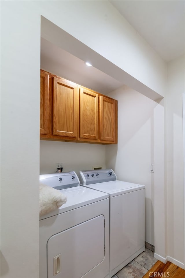10838 Burnet Ave, San Fernando, CA 91345 - laundry area with washing machine and clothes dryer and cabinet space