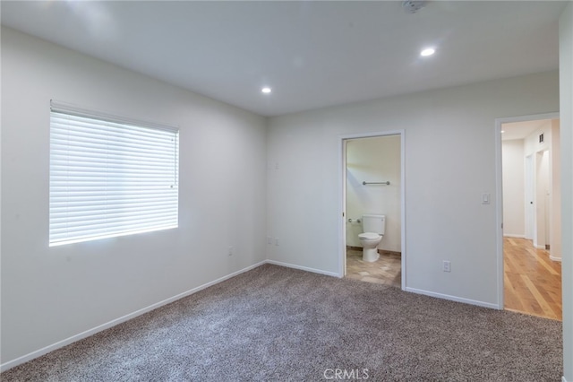 10838 Burnet Ave, San Fernando, CA 91345 - unfurnished bedroom with carpet floors, recessed lighting, and ensuite bathroom