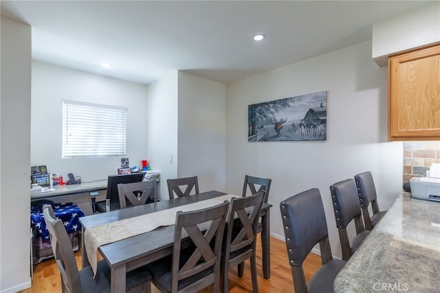 10838 Burnet Ave, San Fernando, CA 91345 - dining space with light wood-style flooring and recessed lighting