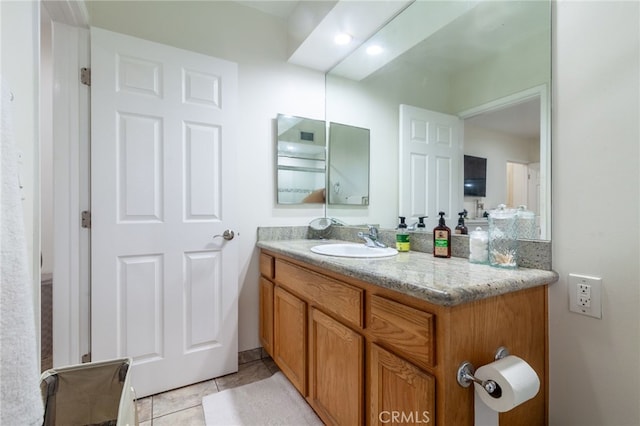 10838 Burnet Ave, San Fernando, CA 91345 - bathroom with vanity and tile patterned floors