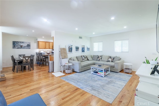 10838 Burnet Ave, San Fernando, CA 91345 - living room featuring recessed lighting and light wood-type flooring