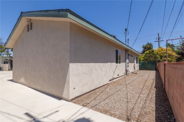 10838 Burnet Ave, San Fernando, CA 91345 - view of property exterior featuring stucco siding and a patio