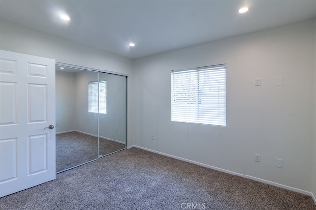 10838 Burnet Ave, San Fernando, CA 91345 - unfurnished bedroom with carpet floors, a closet, and recessed lighting