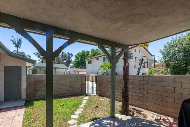 10838 Burnet Ave, San Fernando, CA 91345 - fenced backyard featuring a patio