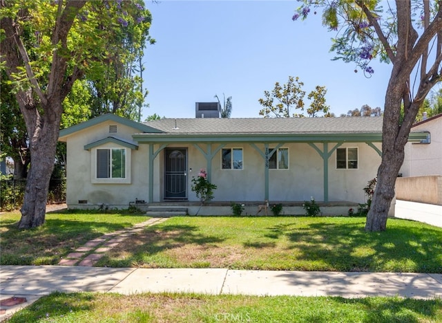 10838 Burnet Ave, San Fernando, CA 91345 - view of front of house with stucco siding, a front lawn, and a chimney