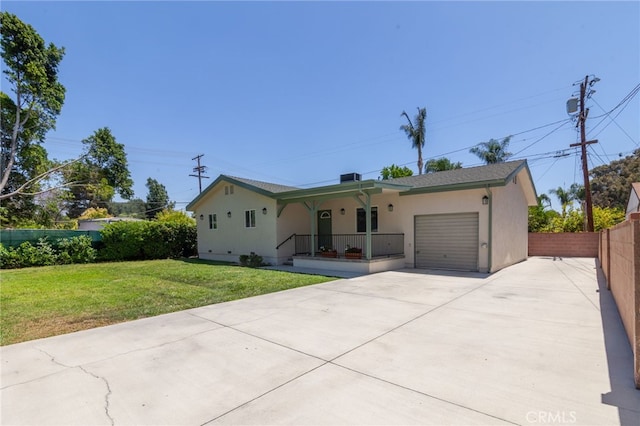 10838 Burnet Ave, San Fernando, CA 91345 - ranch-style house featuring concrete driveway, a garage, stucco siding, and covered porch