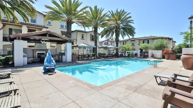 17554 Waterfall Ct, Fountain Valley, CA 92708 - community pool featuring a gazebo, a patio area, area for grilling, and a residential view