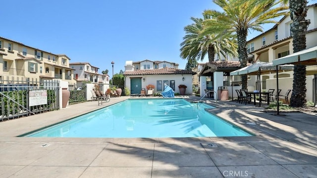 17554 Waterfall Ct, Fountain Valley, CA 92708 - community pool featuring a residential view and a patio area