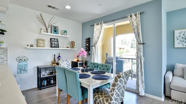 17554 Waterfall Ct, Fountain Valley, CA 92708 - dining area featuring wood finished floors and baseboards