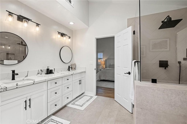 2017 Curtis Ave Unit B, Redondo Beach, CA 90278 - ensuite bathroom featuring double vanity, tiled shower, and tile patterned flooring