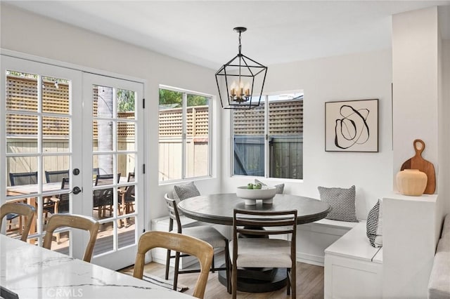 2017 Curtis Ave Unit B, Redondo Beach, CA 90278 - dining room with wood finished floors, a chandelier, and french doors