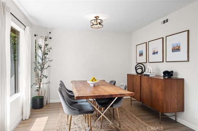 2017 Curtis Ave Unit B, Redondo Beach, CA 90278 - dining room featuring light wood finished floors and a chandelier
