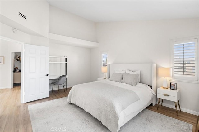 2017 Curtis Ave Unit B, Redondo Beach, CA 90278 - bedroom with light wood-type flooring and high vaulted ceiling