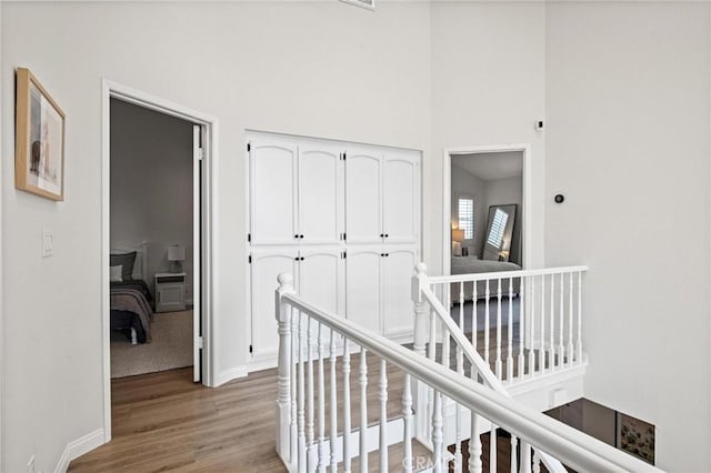 2017 Curtis Ave Unit B, Redondo Beach, CA 90278 - hall with light wood-style flooring, an upstairs landing, and a towering ceiling