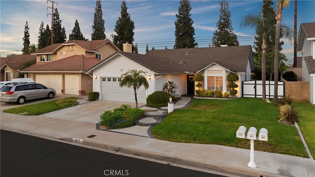 5650 Harvest Way, Yorba Linda, CA 92886 - view of front of home with an attached garage, a tiled roof, driveway, and a chimney