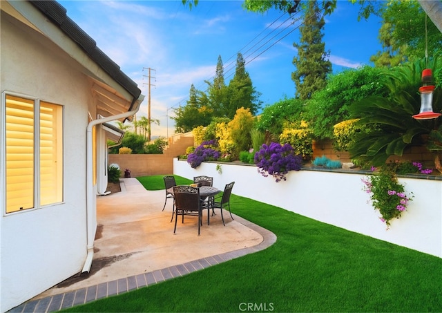 5650 Harvest Way, Yorba Linda, CA 92886 - fenced backyard with a patio area and outdoor dining space