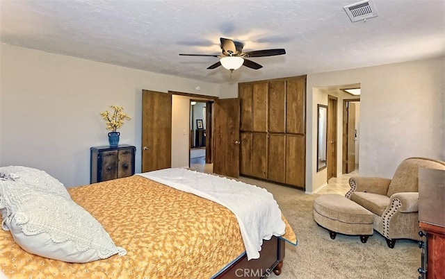 15381 Otomian Rd, Apple Valley, CA 92307 - bedroom with light carpet and a ceiling fan