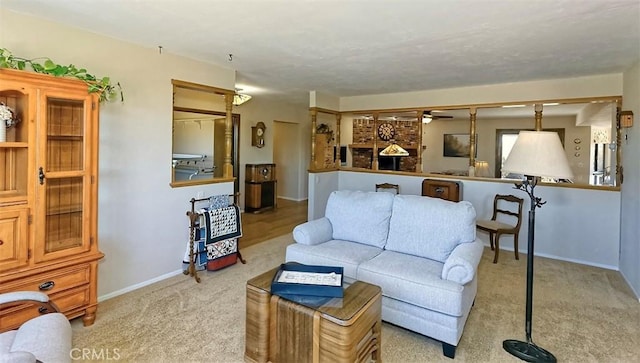 15381 Otomian Rd, Apple Valley, CA 92307 - carpeted living area featuring ceiling fan and baseboards