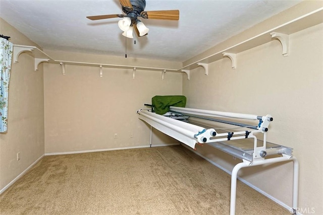 15381 Otomian Rd, Apple Valley, CA 92307 - spacious closet with carpet floors and ceiling fan
