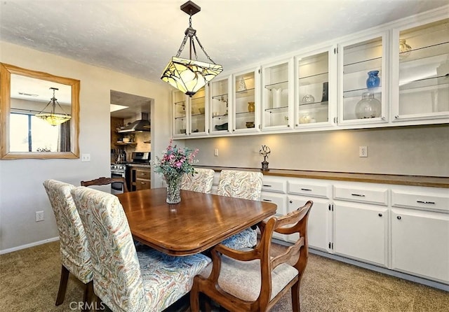 15381 Otomian Rd, Apple Valley, CA 92307 - dining area with carpet and baseboards