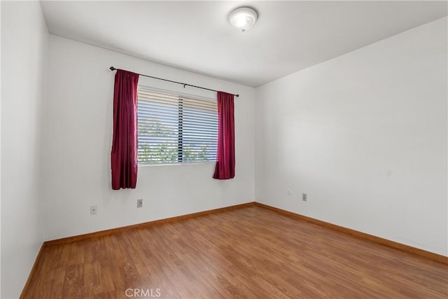 7137 Shoup Ave Unit 39, West Hills, CA 91307 - empty room featuring wood finished floors and baseboards