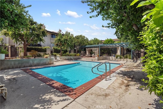 7137 Shoup Ave Unit 39, West Hills, CA 91307 - community pool featuring a patio and a pergola