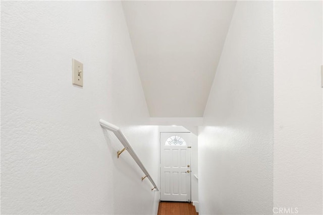 7137 Shoup Ave Unit 39, West Hills, CA 91307 - staircase featuring wood finished floors and a textured wall
