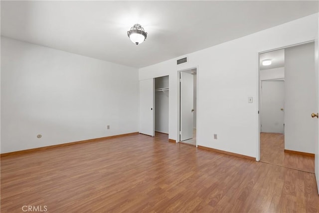 7137 Shoup Ave Unit 39, West Hills, CA 91307 - unfurnished bedroom featuring light wood-type flooring and baseboards