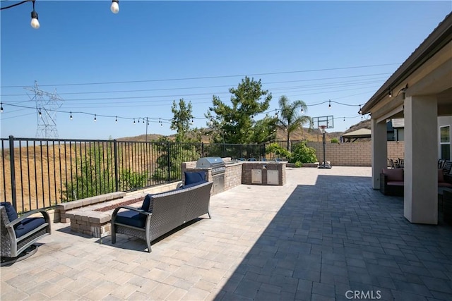 19680 Griffith Dr, Saugus, CA 91350 - fenced backyard with an outdoor kitchen and a patio