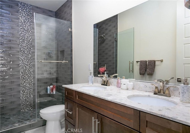 19680 Griffith Dr, Saugus, CA 91350 - bathroom featuring double vanity, a stall shower, and tile patterned floors