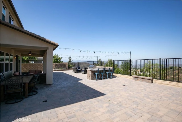 19680 Griffith Dr, Saugus, CA 91350 - fenced backyard featuring outdoor dining area, a patio, and ceiling fan