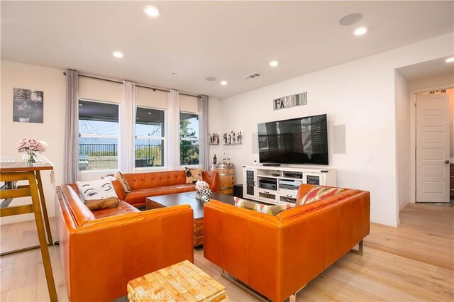 19680 Griffith Dr, Saugus, CA 91350 - living area with light wood-style floors and recessed lighting