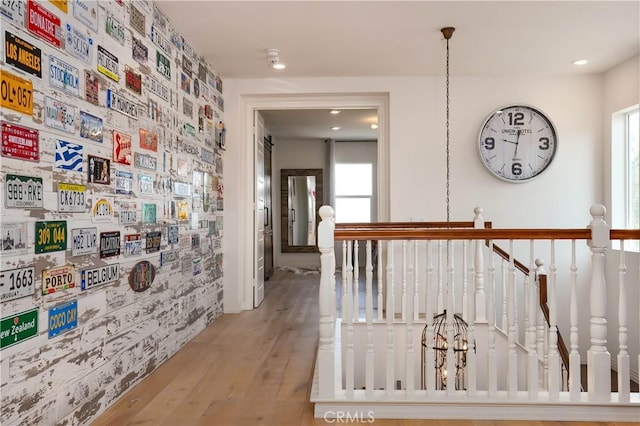 19680 Griffith Dr, Saugus, CA 91350 - corridor featuring wood finished floors, an upstairs landing, and recessed lighting