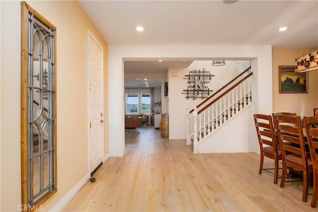 19680 Griffith Dr, Saugus, CA 91350 - foyer entrance with stairway, wood finished floors, and recessed lighting