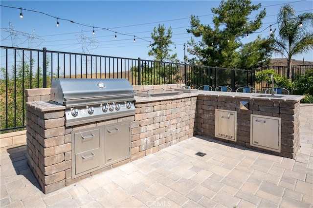 19680 Griffith Dr, Saugus, CA 91350 - view of patio / terrace with an outdoor kitchen