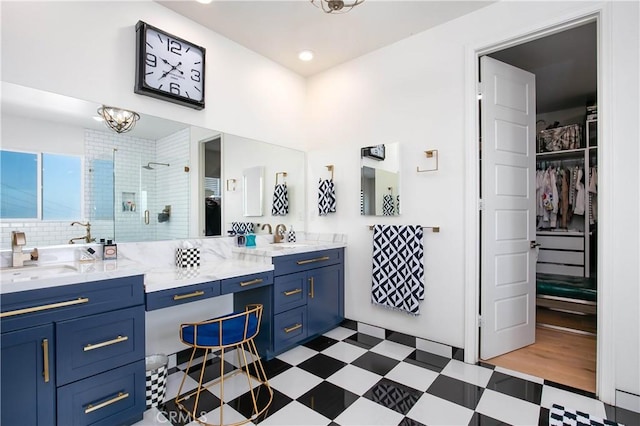19680 Griffith Dr, Saugus, CA 91350 - bathroom with tile patterned floors, a spacious closet, double vanity, a stall shower, and recessed lighting