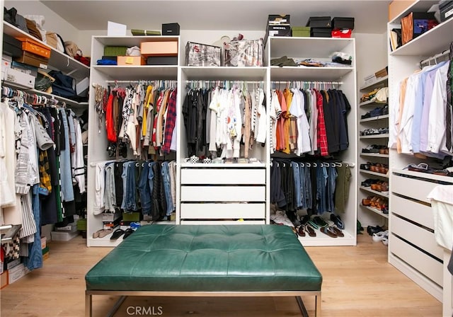 19680 Griffith Dr, Saugus, CA 91350 - walk in closet featuring wood finished floors
