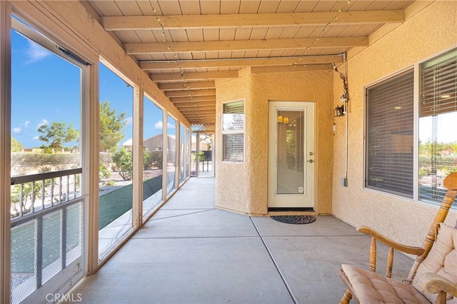 14908 Dakota Rd, Apple Valley, CA 92307 - unfurnished sunroom with beam ceiling