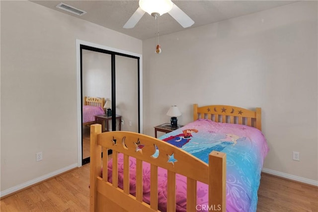 14908 Dakota Rd, Apple Valley, CA 92307 - bedroom with wood finished floors, a closet, and a ceiling fan