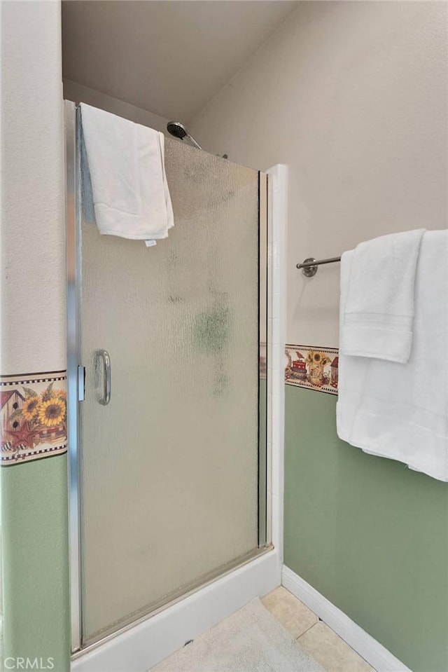 14908 Dakota Rd, Apple Valley, CA 92307 - bathroom featuring a stall shower and tile patterned floors