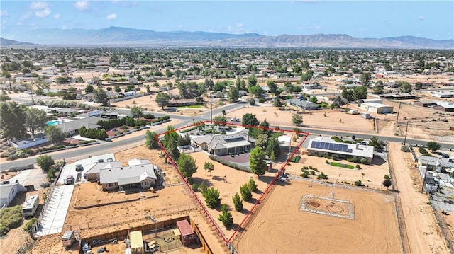 14908 Dakota Rd, Apple Valley, CA 92307 - aerial view of residential area featuring a mountainous background and property parcel outlined