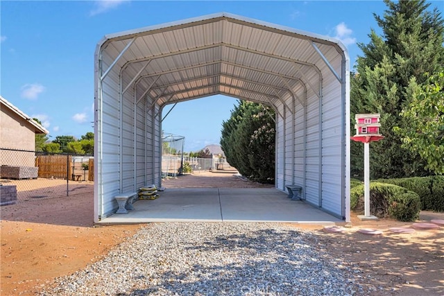 14908 Dakota Rd, Apple Valley, CA 92307 - view of car parking with a carport and gravel driveway
