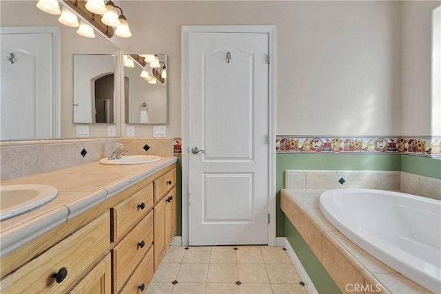 14908 Dakota Rd, Apple Valley, CA 92307 - bathroom featuring double vanity, a bath, and tile patterned flooring