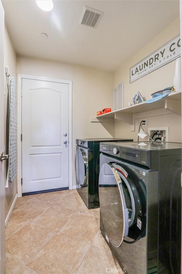 32124 Evening Primrose Trl, Campo, CA 91906 - laundry area featuring separate washer and dryer and light tile patterned floors