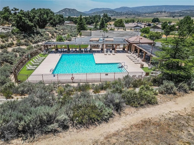 32124 Evening Primrose Trl, Campo, CA 91906 - community pool with a patio area and a mountain view