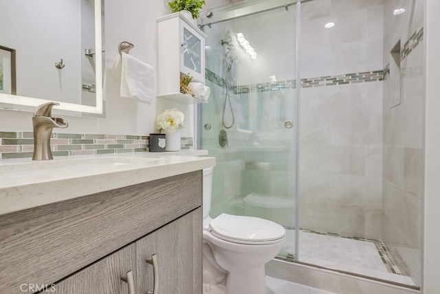 373 W Pebble Creek Ln, Orange, CA 92865 - bathroom with vanity, a stall shower, and backsplash