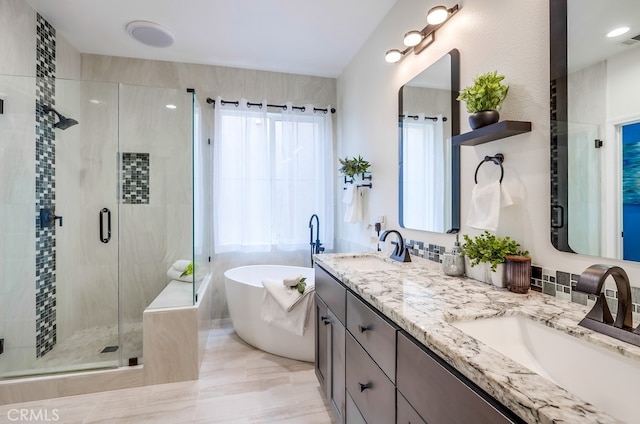 373 W Pebble Creek Ln, Orange, CA 92865 - full bathroom with a soaking tub, a stall shower, and double vanity