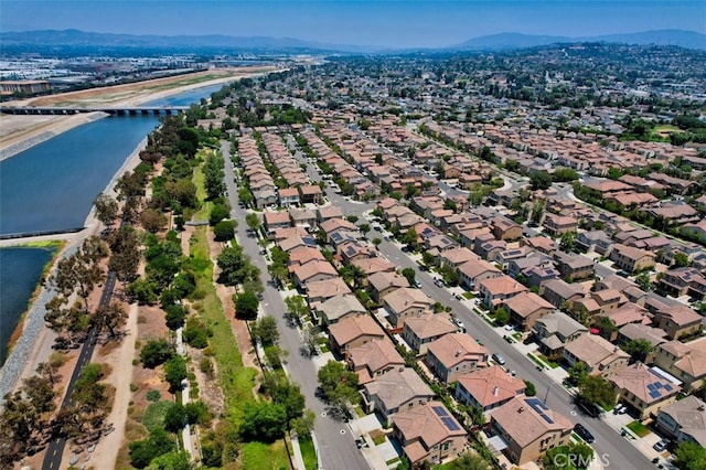 373 W Pebble Creek Ln, Orange, CA 92865 - aerial view of property's location with a water and mountain view and nearby suburban area