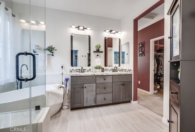 373 W Pebble Creek Ln, Orange, CA 92865 - full bath featuring double vanity, a spacious closet, and a shower with door